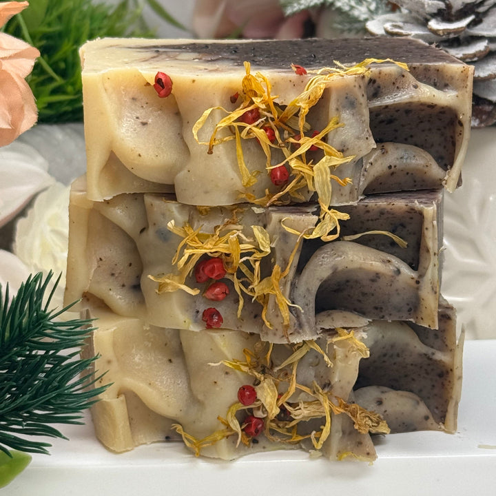 Handmade soap bar with natural ingredients on a white background