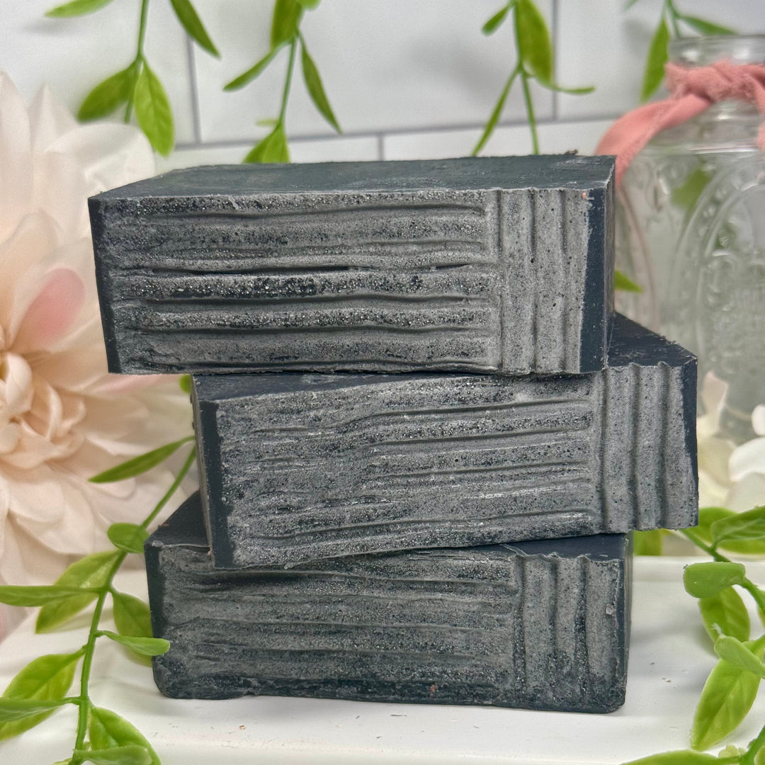 Cedarwood eucalyptus aloe vera soap, aloe vera charcoal soap, lump of coal aloe vera soap, handmade cedarwood eucalyptus soap, moisturizing charcoal aloe vera soap, nourishing cedarwood eucalyptus soap, natural lump of coal soap, hydrating cedarwood eucalyptus aloe vera soap, detoxifying charcoal aloe vera soap, eucalyptus cedarwood charcoal soap.