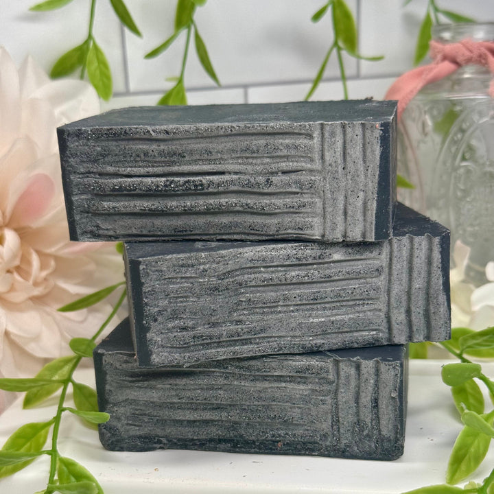 Cedarwood eucalyptus aloe vera soap, aloe vera charcoal soap, lump of coal aloe vera soap, handmade cedarwood eucalyptus soap, moisturizing charcoal aloe vera soap, nourishing cedarwood eucalyptus soap, natural lump of coal soap, hydrating cedarwood eucalyptus aloe vera soap, detoxifying charcoal aloe vera soap, eucalyptus cedarwood charcoal soap.