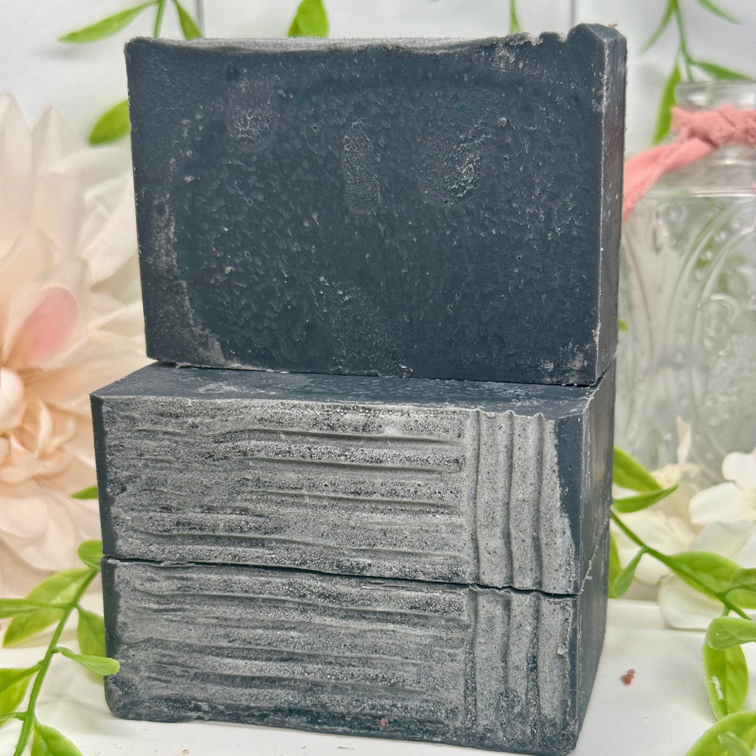 Cedarwood eucalyptus aloe vera soap, aloe vera charcoal soap, lump of coal aloe vera soap, handmade cedarwood eucalyptus soap, moisturizing charcoal aloe vera soap, nourishing cedarwood eucalyptus soap, natural lump of coal soap, hydrating cedarwood eucalyptus aloe vera soap, detoxifying charcoal aloe vera soap, eucalyptus cedarwood charcoal soap.