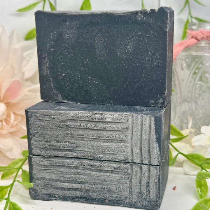 Cedarwood eucalyptus aloe vera soap, aloe vera charcoal soap, lump of coal aloe vera soap, handmade cedarwood eucalyptus soap, moisturizing charcoal aloe vera soap, nourishing cedarwood eucalyptus soap, natural lump of coal soap, hydrating cedarwood eucalyptus aloe vera soap, detoxifying charcoal aloe vera soap, eucalyptus cedarwood charcoal soap.