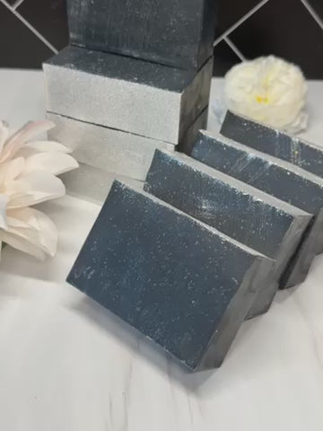 Charcoal, deep cleansing, detoxifier, draws out impurities, unclogs pores, reduces acne, oil control, absorbs excess oil, bentonite clay, absorbent, detoxifies skin, anti-inflammatory, reduces redness, lavender essential oil, antibacterial, kills acne bacteria, calming, soothing skin, promotes healing, reduces acne scars, tea tree oil, antimicrobial, reduces swelling, balances sebum, regulates oil, shea butter, deep hydration, non-comedogenic, vitamins A and E, healing scars, handcrafted soap benefits, bala